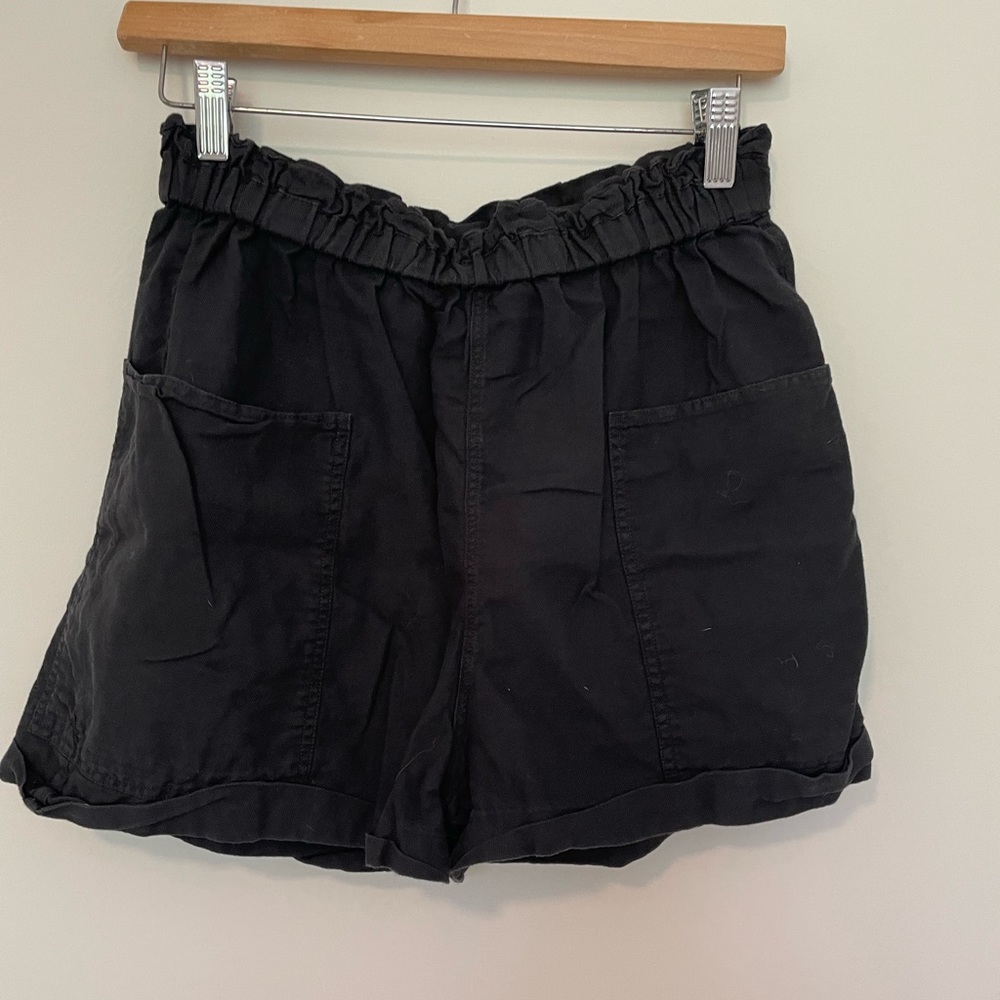 Black shorts, pockets in front